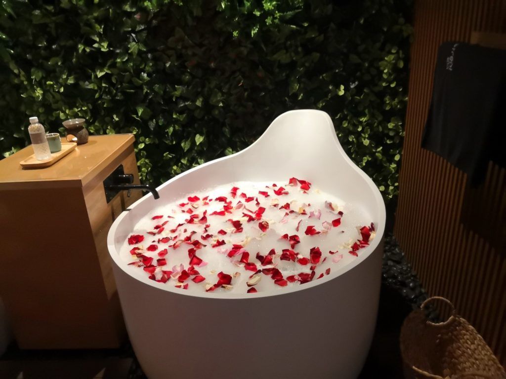 Hot milk bath topped with rose petals